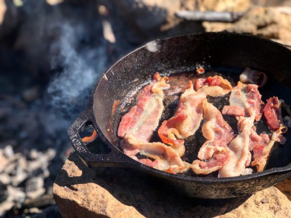 Loaded BLT Bowls | SavingDinner.com bacon cooking in a skillet