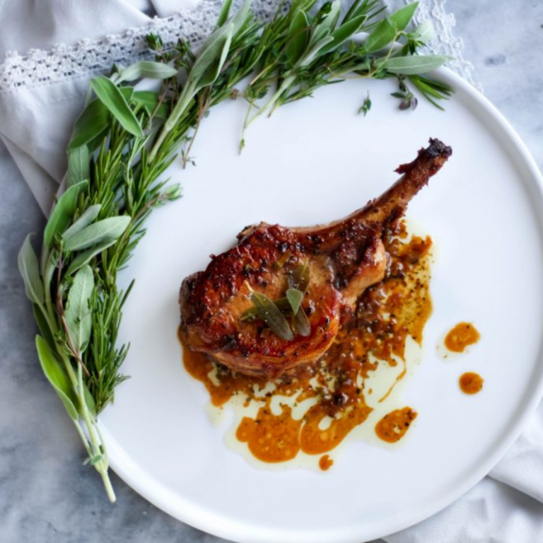 PanSeared Butter Braised Pork Chops with Herb White Wine Reduction
